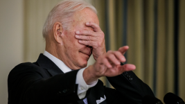 President-Biden-closes-his-eyes-and-points-at-reporters-during-remarks-on-passage-of-Infrastru...png