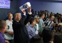 President-Donald-Trump-tosses-paper-towels-into-a-crowd-at-Calvary-Chapel-in-Guaynabo-Puerto-R...jpg