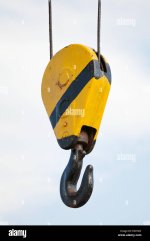 crane-hook-hanging-on-steel-ropes-over-cloudy-sky-background-EK0T2N.jpg