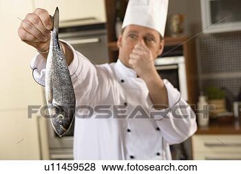 chef-holding-smelly_~u11459528.jpg