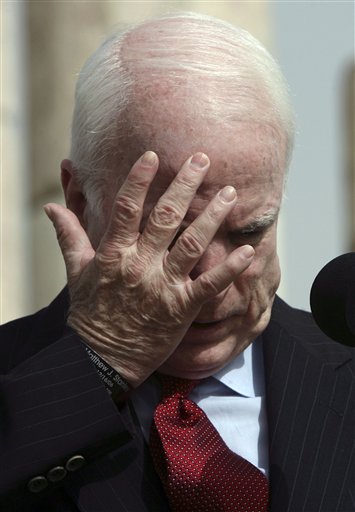 mccain-hand-on-face.jpg