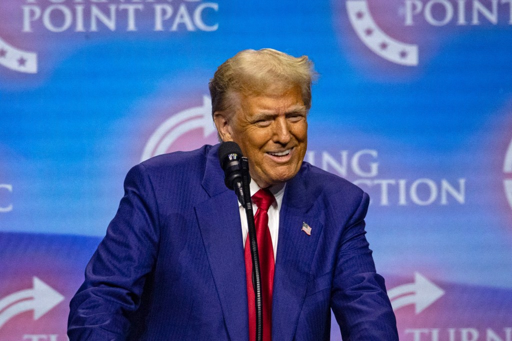 Former US President and Republican presidential candidate Donald Trump speaks during a campaign rally at the Gas South Arena in Duluth, Georgia, on October 23, 2024.